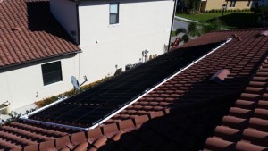 Solar Pool Heating Panels on a Tile Roof